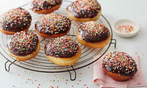 Chocolate dipped doughnuts with sprinkles