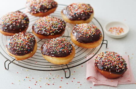 Chocolate dipped doughnuts with sprinkles