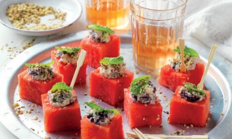Watermelon cubes with feta olives and mint