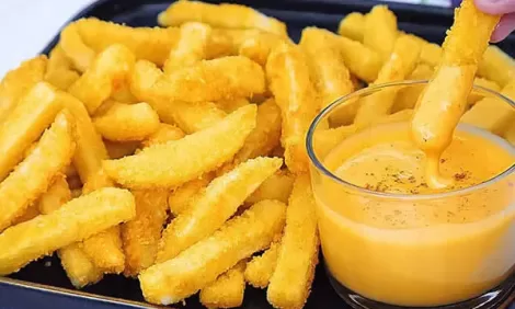 Crispy French Fries and Cheese Sauce