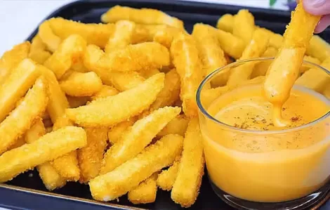 Crispy French Fries and Cheese Sauce
